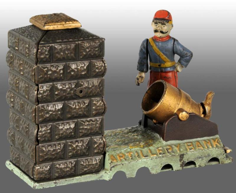 Appraisal: Cast Iron Artillery Mechanical Bank Description Manufactured by J E