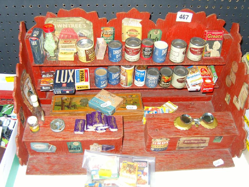 Appraisal: A wooden toy grocery shop complete with a set of