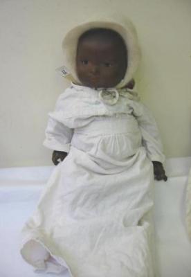 Appraisal: An Armand Marseille bisque head Mulatto baby doll with brown