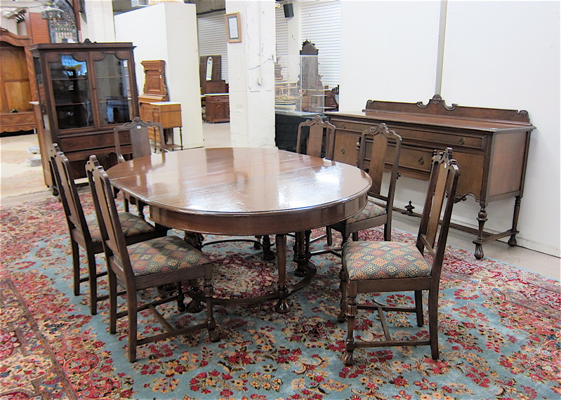 Appraisal: NINE-PIECE WALNUT AND MAHOGANY DINING ROOM FURNITURE SET Luce Furniture