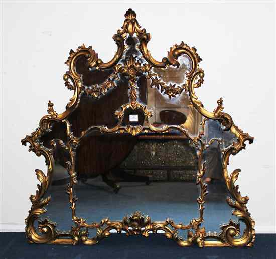 Appraisal: A Chippendale style carved giltwood and gesso rococco overmantel mirror