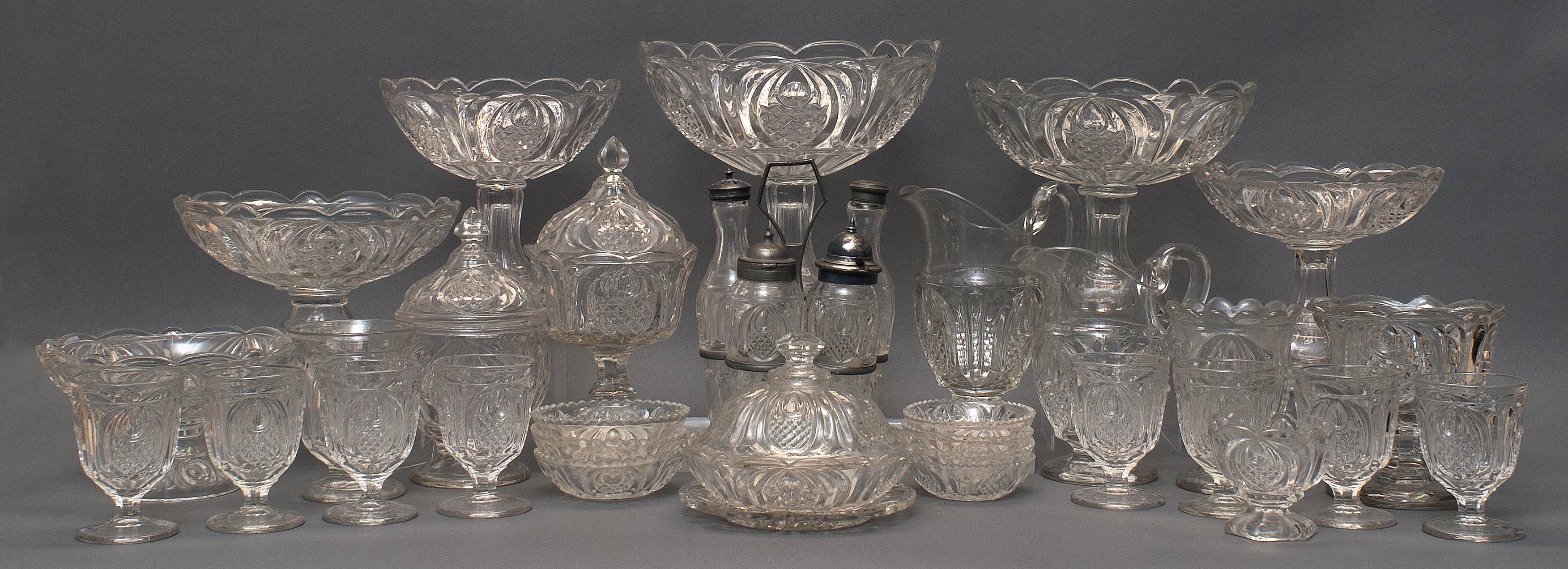 Appraisal: THIRTY-FIVE PIECES OF SANDWICH GLASS COMPANY FLINT PATTERN GLASS TABLEWARE