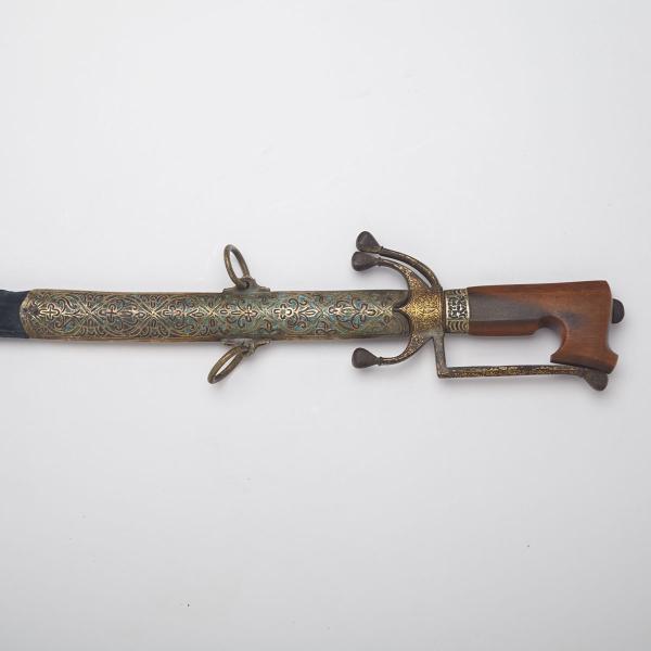 Appraisal: Moroccan Gold Damascened and Enamelled Nimcha Sword c the slightly