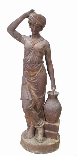 Appraisal: A cast iron figure of a woman with a jug