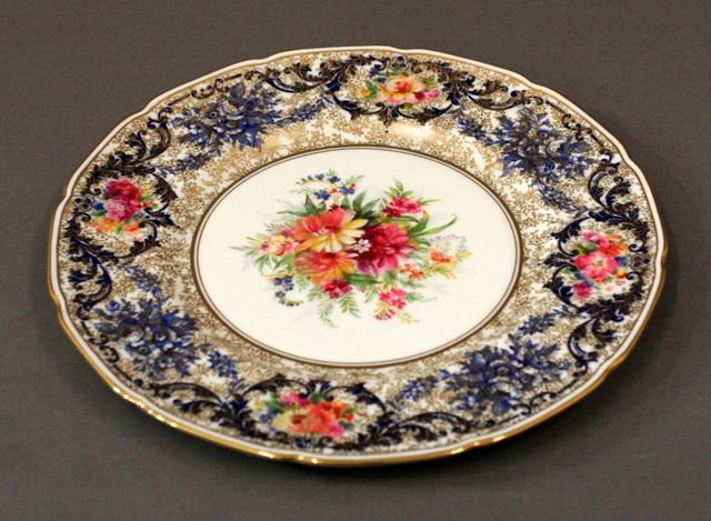 Appraisal: A Royal Doulton cabinet plate painted by Edwin Wood with