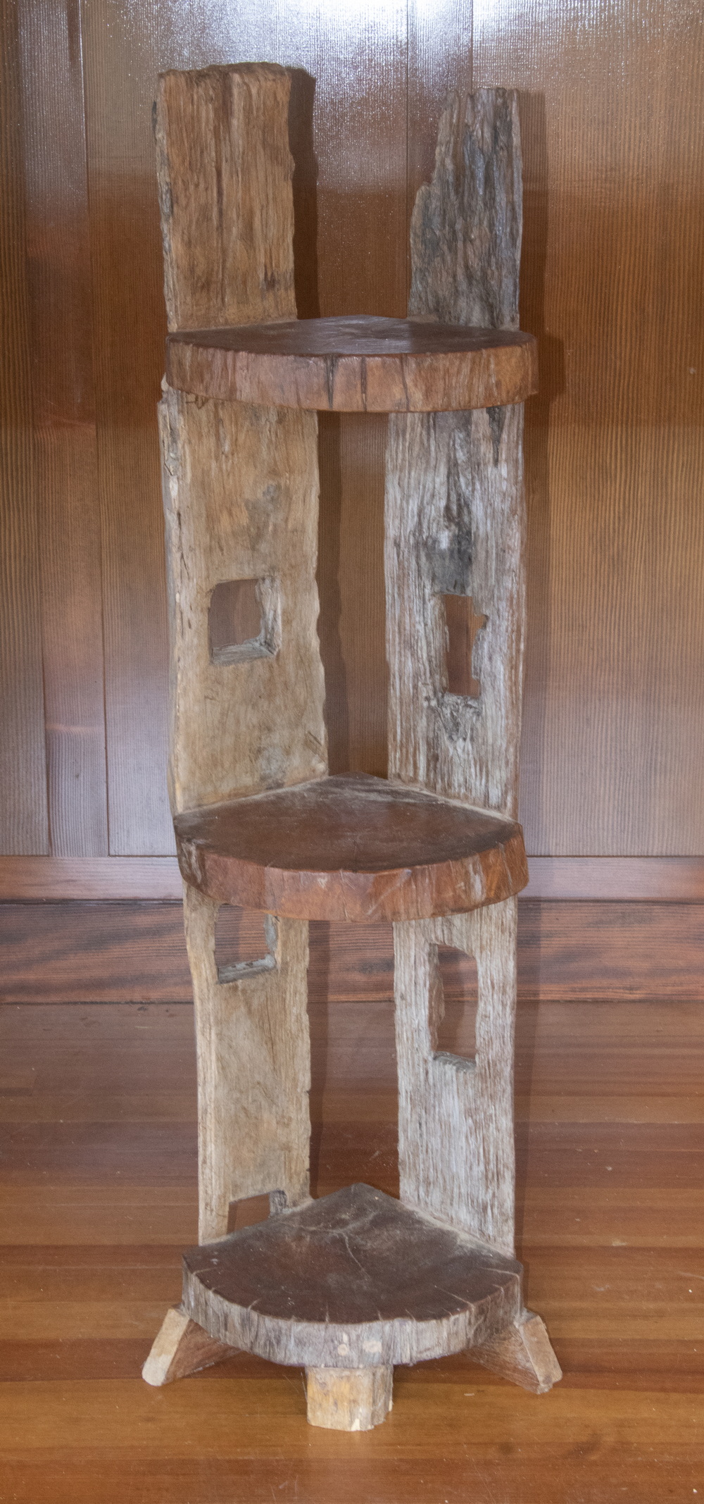 Appraisal: CORNER SHELF Three-Shelf Unit carved from one tree natural wood