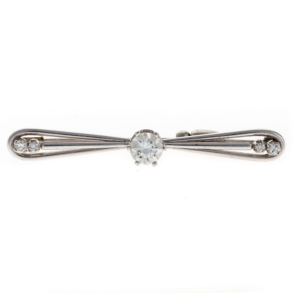 Appraisal: A Ladies Diamond Pin in Platinum Platinum pin featuring a