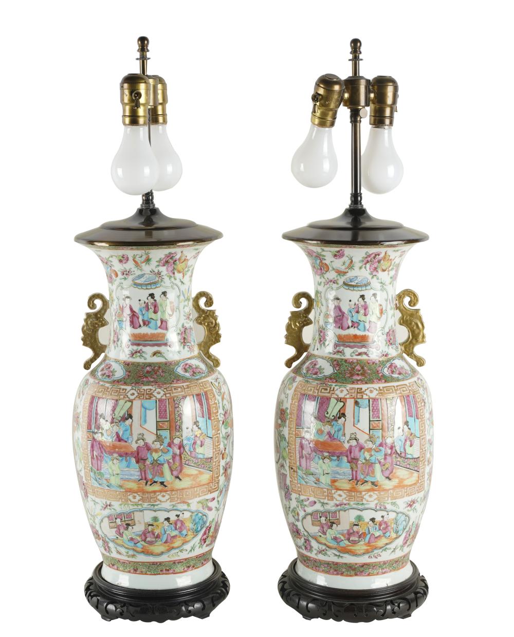 Appraisal: PAIR OF CHINESE FAMILLE ROSE VASESporcelain vases electrified as table