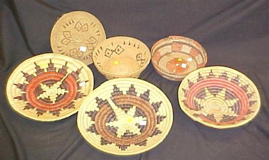 Appraisal: Five woven baskets including three Native American in traditional Navajo