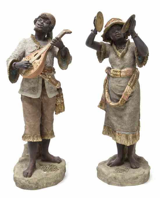 Appraisal: A Pair of Ceramic Blackamoor Figures depicting a male and