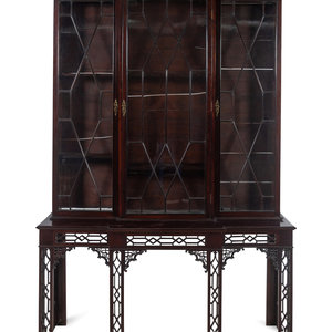 Appraisal: A Chinese Chippendale Pierce-Carved Mahogany Breakfront Bookcase on Stand Late