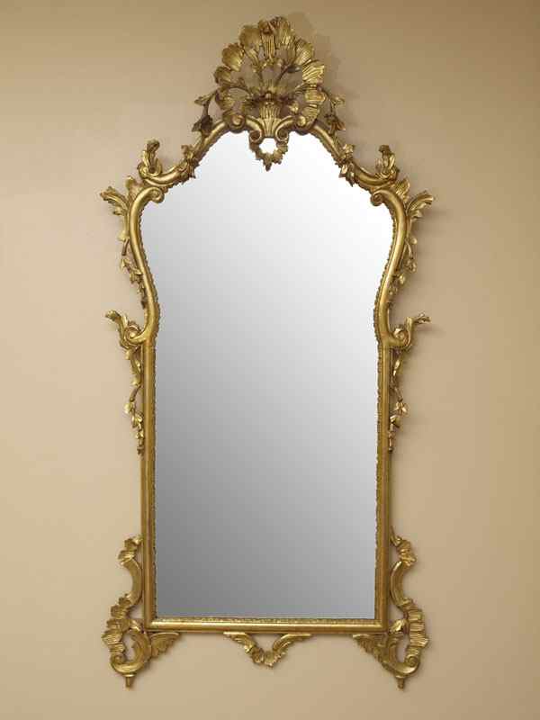 Appraisal: ORNATE CARVED GILT WOOD MIRROR Carved and pierced with floral