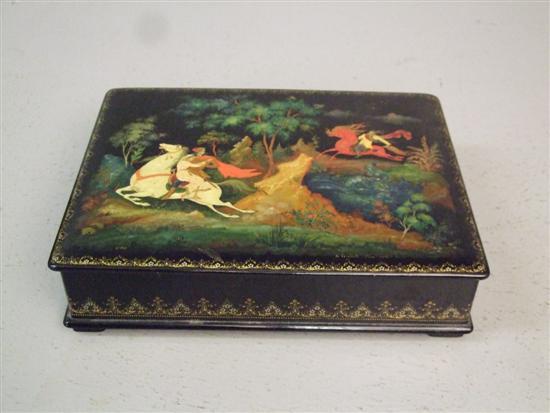 Appraisal: th century Russian lacquered rectangular box the cover painted with