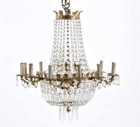 Appraisal: Empire style crystal and brass twelve light chandelier brass collars