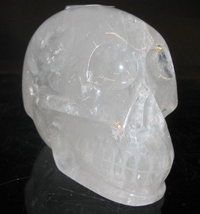 Appraisal: A NATURAL ROCK CRYSTAL SCULPTURE OF A HUMAN SKULL Length