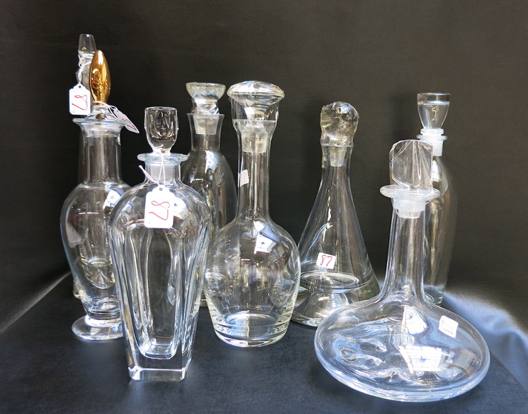 Appraisal: SEVEN CRYSTAL DECANTERS various sizes and shapes makers such as