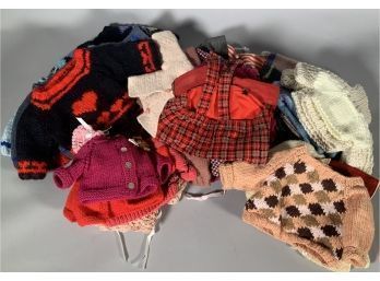 Appraisal: An assembled lot of mostly woolen doll clothes sweaters hats