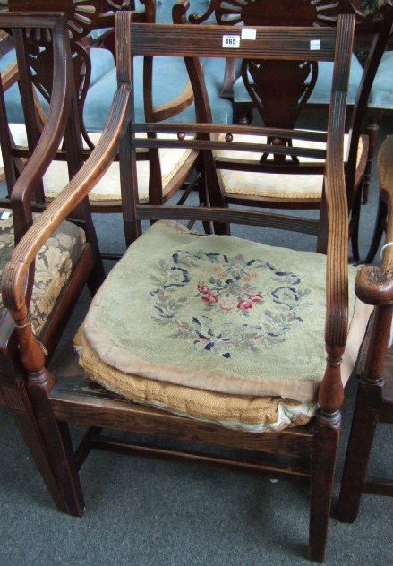 Appraisal: A Regency mahogany rail back armchair with solid seat