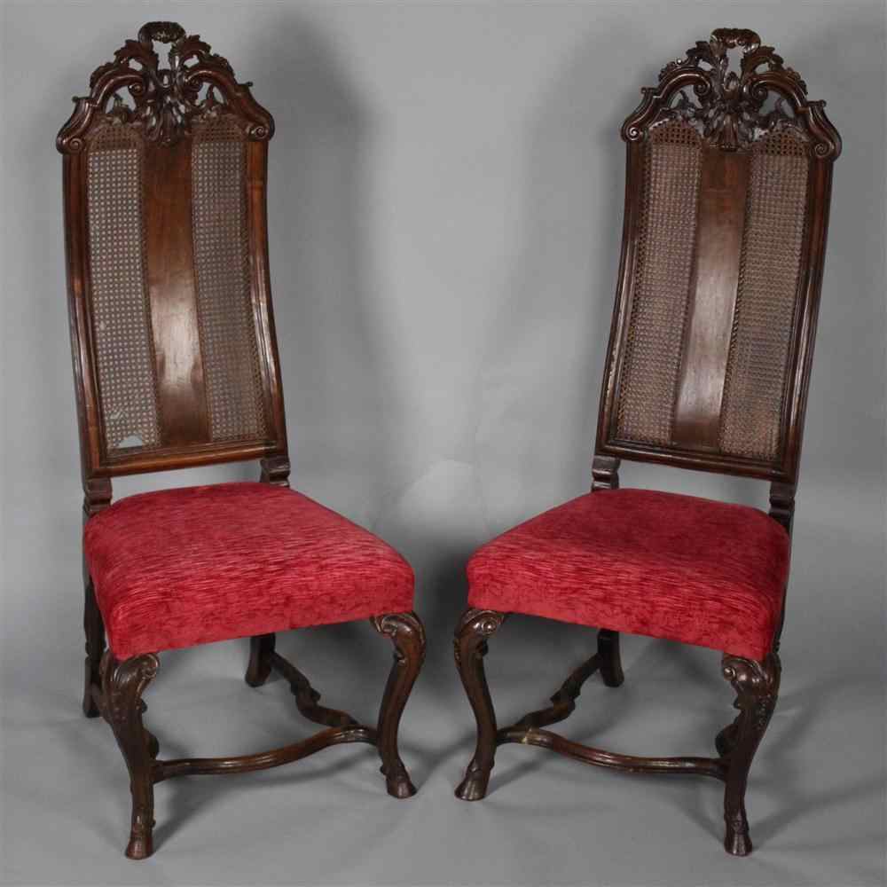 Appraisal: PAIR OF WALNUT BAROQUE STYLE CHAIRS each having an elaborately