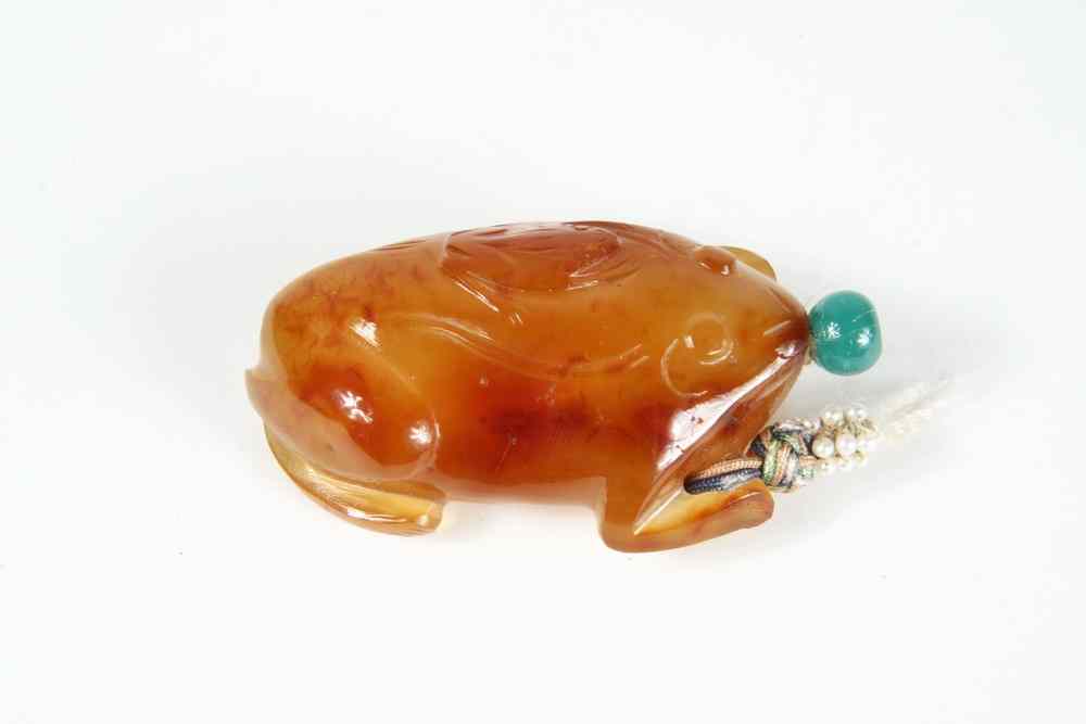 Appraisal: JADE SNUFF BOTTLE - Red Orange Carved Jadeite in the