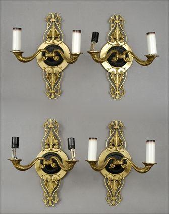 Appraisal: Four Empire-Style Gilt-Brass and Patinated Metal Two-Light Wall Sconces x