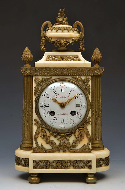 Appraisal: A TH CENTURY FRENCH MANTEL CLOCK with convex white enamel