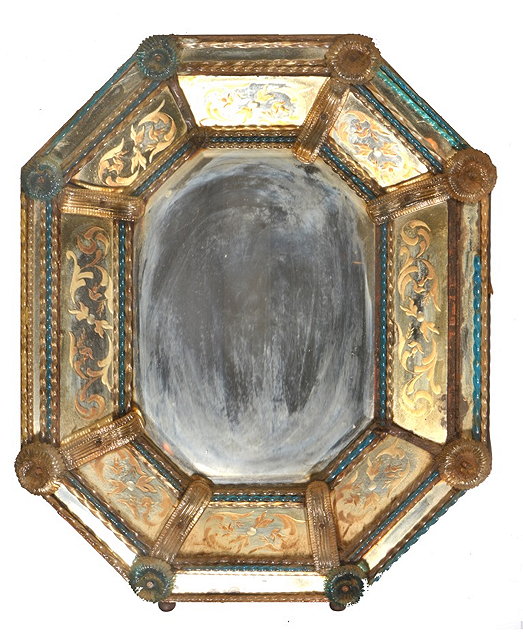 Appraisal: A VENETIAN COLOURED GLASS AND ETCHED WALL MIRROR with blue