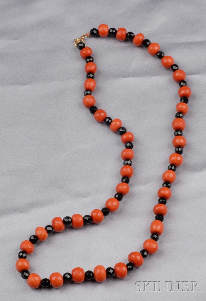 Appraisal: Coral and Onyx Bead Necklace composed of alternating faceted coral