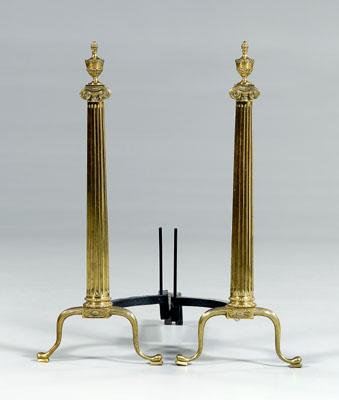 Appraisal: Pair brass andirons urn finials above tapered and reeded columns