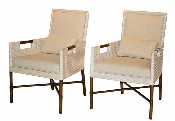 Appraisal: A pair of Thomas Pheasant rattan and woven leather armchairs