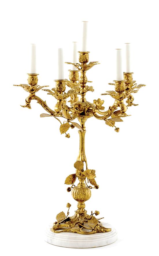 Appraisal: French gilt-bronze and marble candelabra-form table lamp early th century