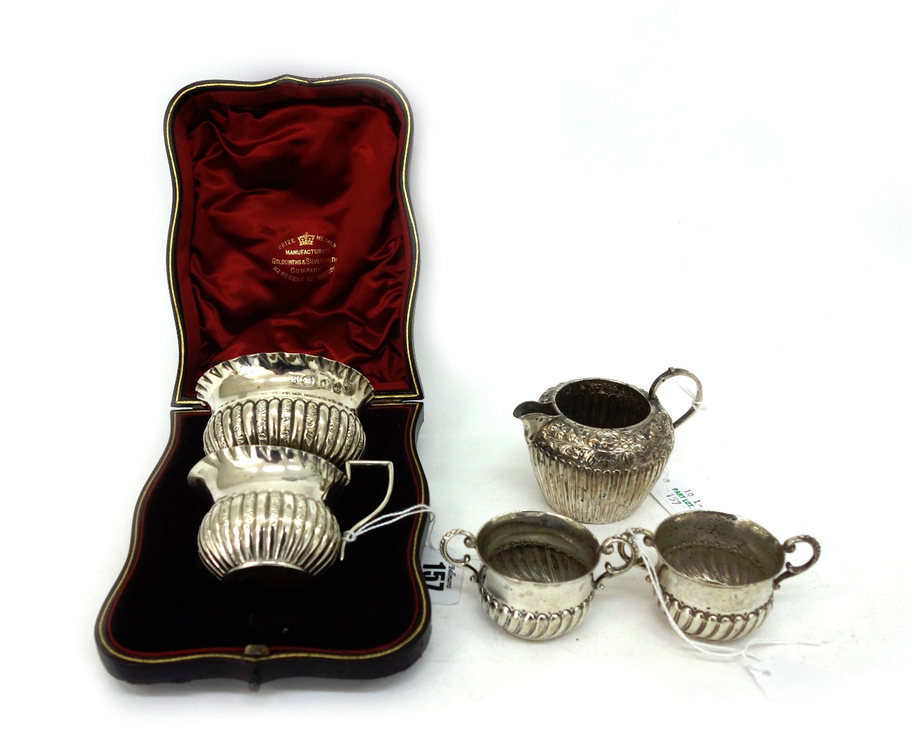 Appraisal: A Victorian silver sugar basin and cream jug Vale Bros