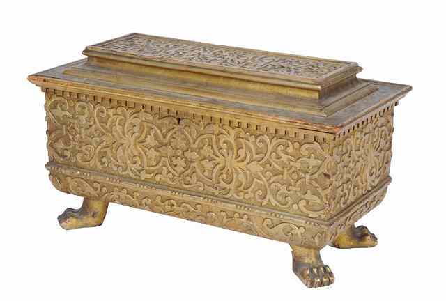 Appraisal: AN ITALIAN GILTWOOD CASSONE with hinged rising lid carved scroll