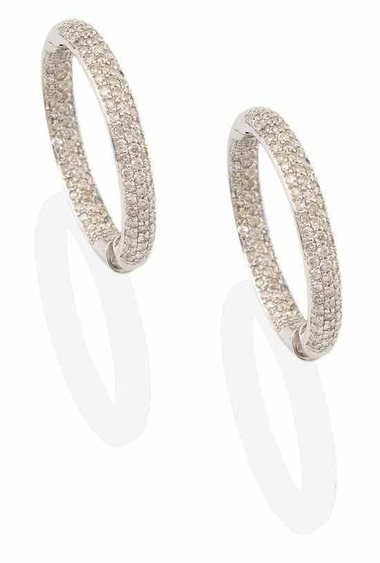 Appraisal: A PAIR OF DIAMOND HOOP EARRINGS Each hinged hoop pave