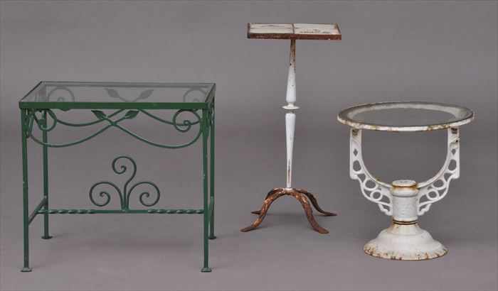 Appraisal: TWO WHITE-PAINTED CAST-IRON GARDEN TABLES One with Delft tile-inset top