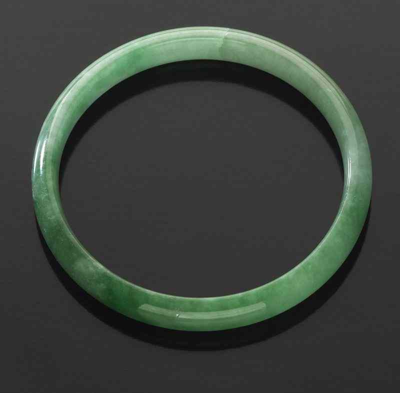 Appraisal: Chinese carved jadeite bracelet '' Dia Circa - th C