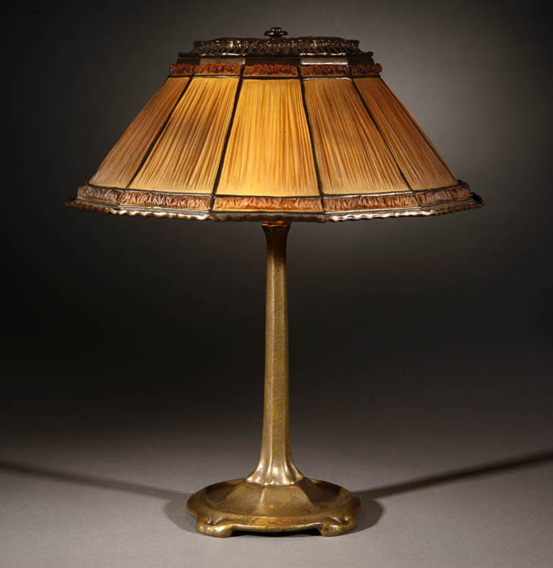 Appraisal: A Tiffany Favrile 'Fabrique' glass bronze lamp A Tiffany Favrile