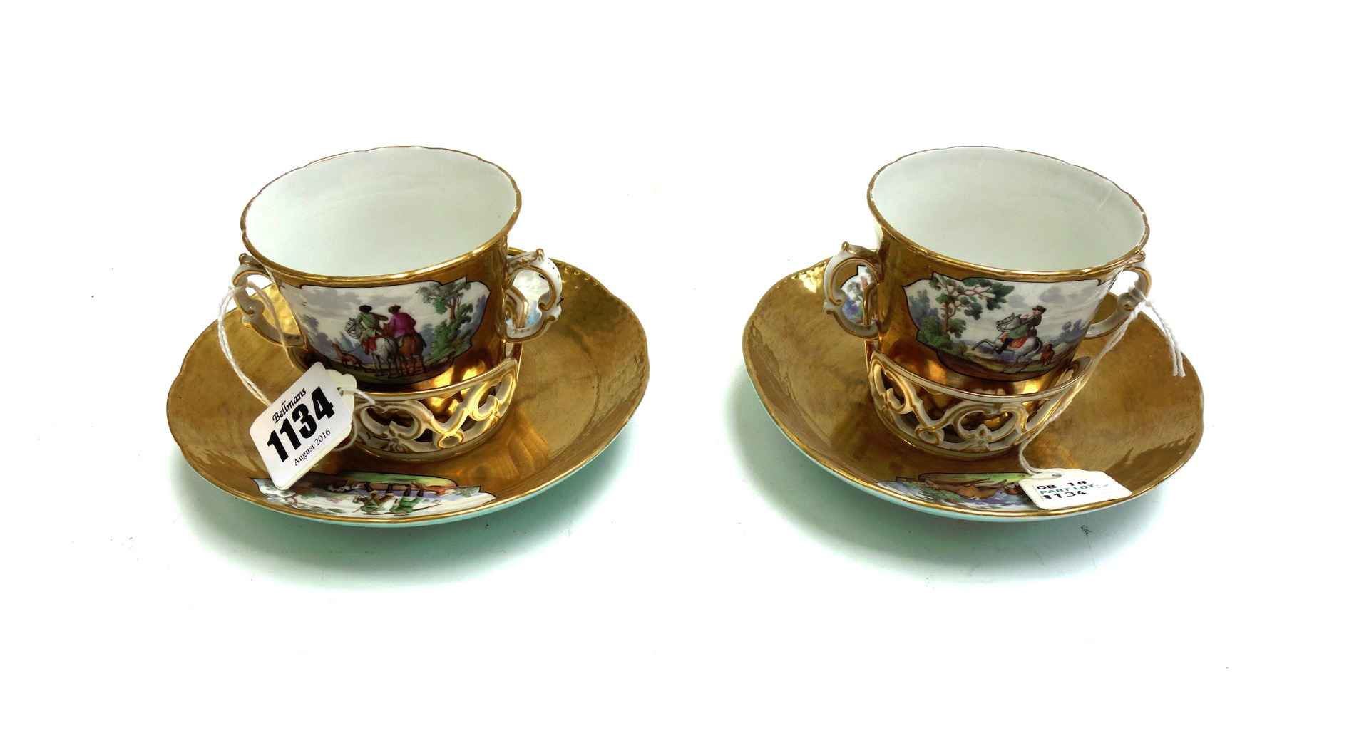 Appraisal: Two Berlin porcelain trembleuese two handled cups and saucers late