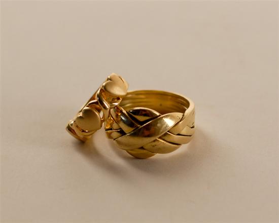 Appraisal: Two K marked Yellow Gold Rings one a gent's puzzle