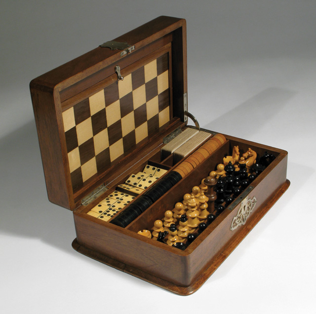 Appraisal: VICTORIAN OAK CASED GAME SET The hinged oak box adorned