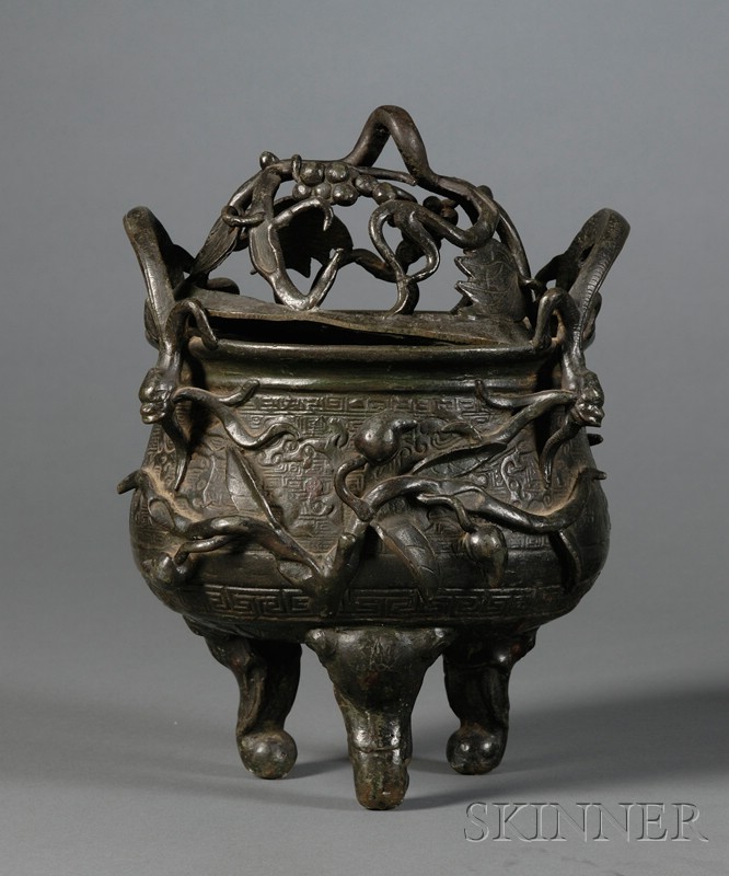 Appraisal: Bronze Censer China th century tripod base oval body dragon