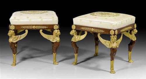 Appraisal: PAIR OF MAHOGANY STOOLS WITH LION SUPPORTS Empire style Paris