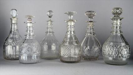 Appraisal: GROUP OF SIX ANGLO IRISH CUT-GLASS RING-NECK DECANTERS AND STOPPERS