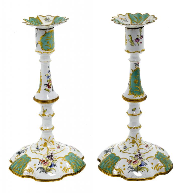 Appraisal: A PAIR OF GEORGE III SOUTH STAFFORDSHIRE ENAMEL CANDLESTICKS with