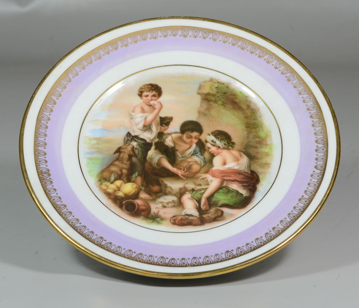 Appraisal: Continental porcelain musical plate central scene after Murillo box plays