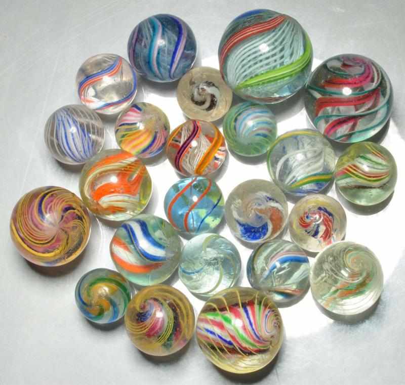 Appraisal: Lot of Assorted Swirl Marbles Description Includes three coreless swirls