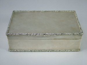 Appraisal: A mid th century silver cigarette box London of rectangular