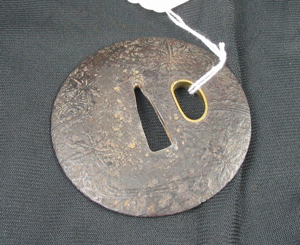 Appraisal: JAPANESE TSUBA of the maru gata round type made of