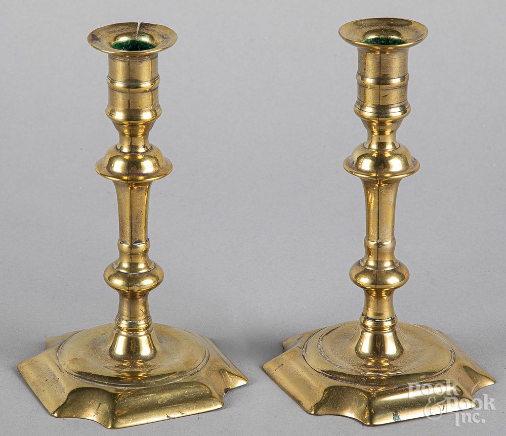 Appraisal: Pair of Queen Anne brass candlesticks Pair of Queen Anne