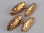 Appraisal: A pair of Victorian carat gold torpedo cufflinks with engraved